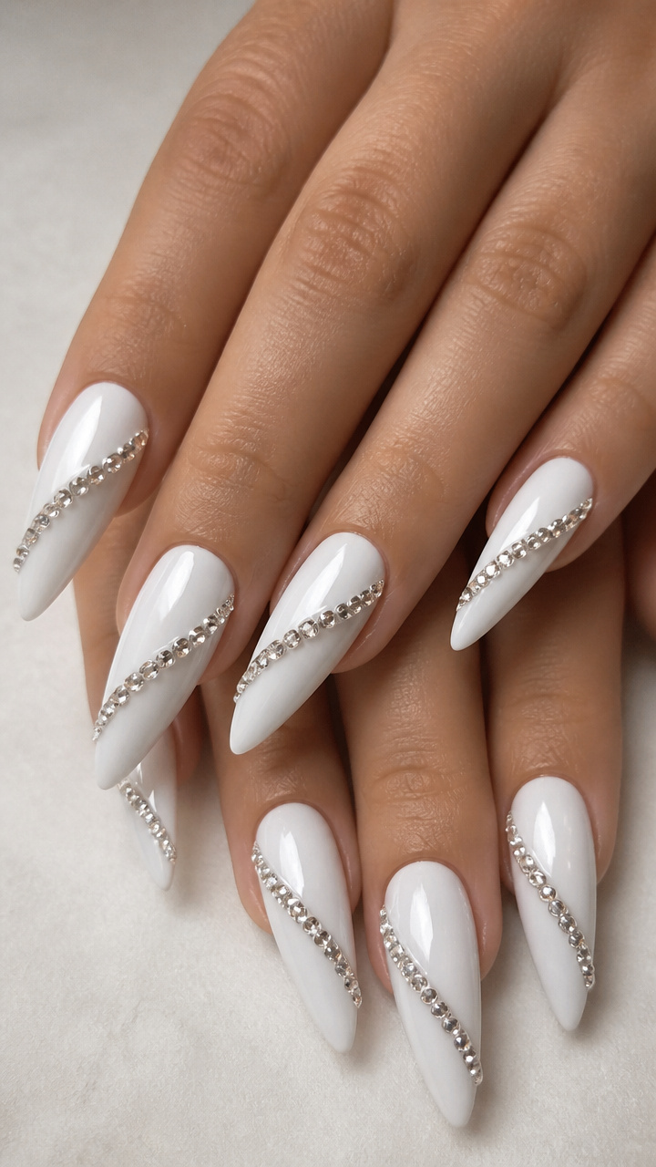 White Glossy Stiletto Nails with Rhinestone Diagonal Stripes