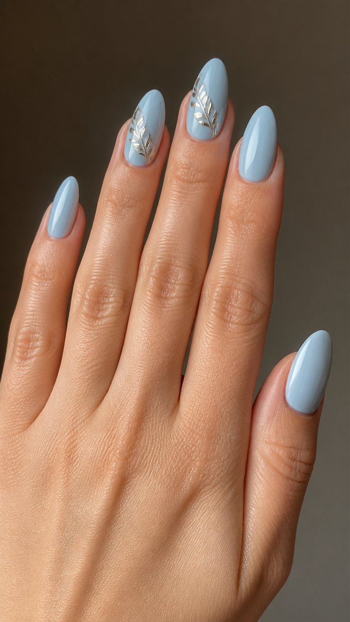 Glacier Blue Almond Nails with Chrome Leaf Accents