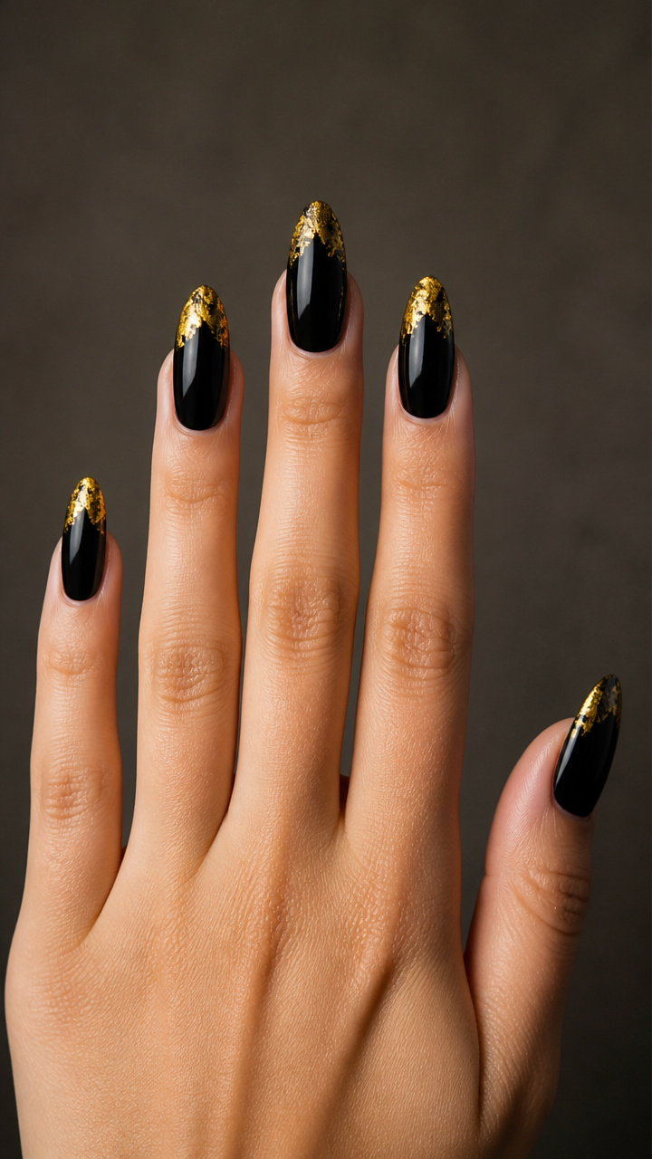 Gold Foil Tips on Black Almond Nails